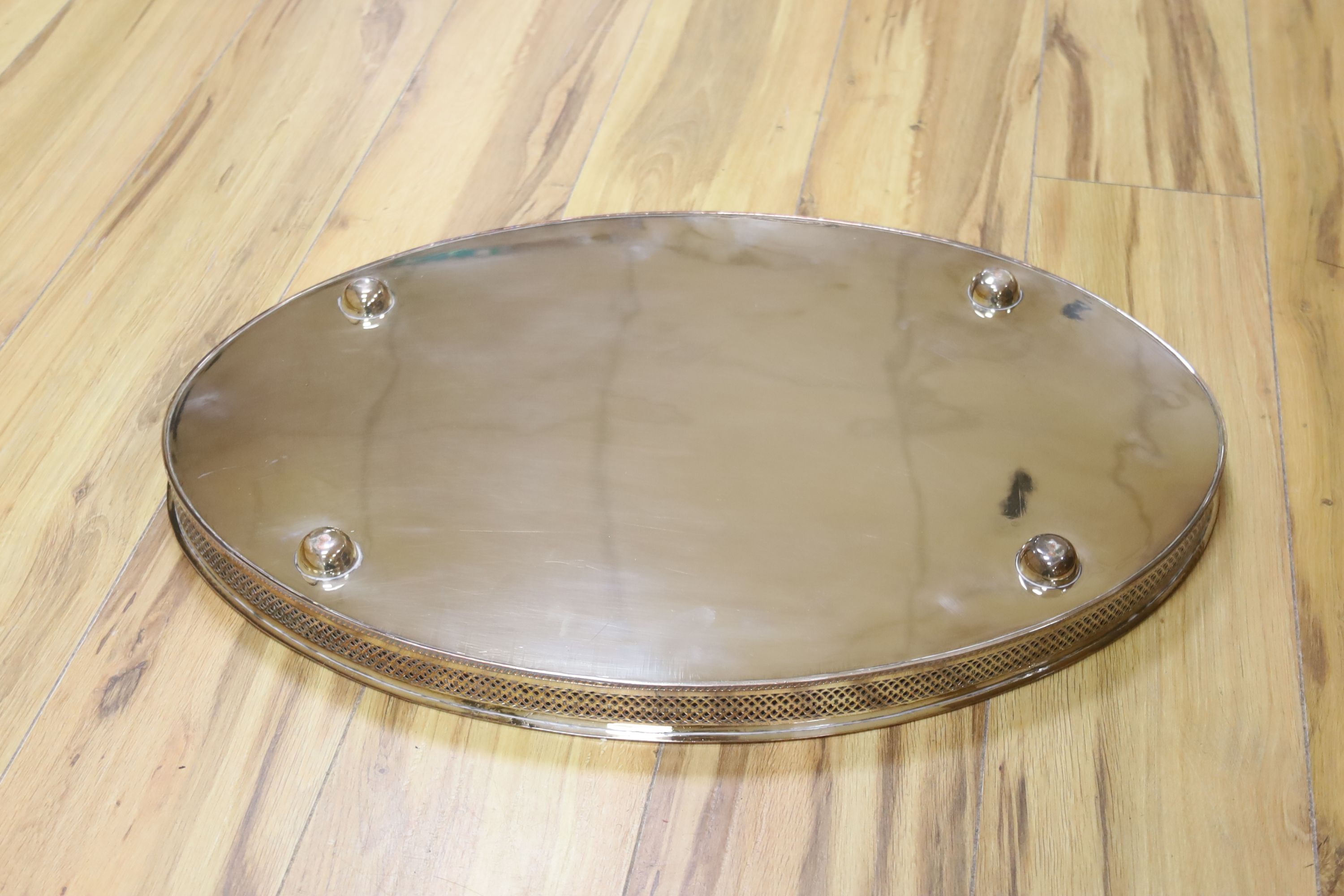 A silver plated oval gallery tray, width 61cm